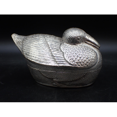 11 - A white metal Box and Cover in the form of a duck, 7in, possibly Cambodian