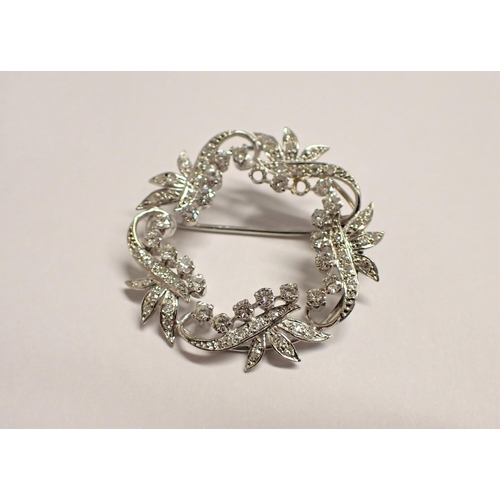 113 - A Diamond Wreath Brooch claw and pavé-set throughout brilliant and eight-cut stones, unmarked, untes... 