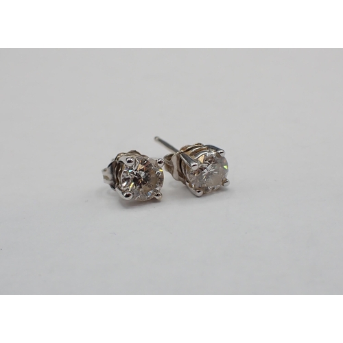 117 - A pair of Diamond Ear Studs each claw-set brilliant-cut stone, estimated total diamond weight 1.0ct,... 