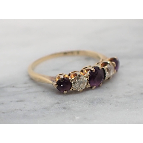 127 - An Amethyst and Diamond five stone Ring claw-set three round amethysts with two old-cut diamonds bet... 