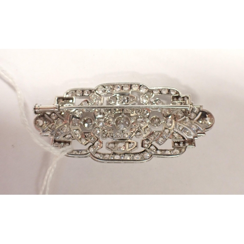 144 - An Art Deco Diamond Brooch the openwork elliptical plaque pavé-set throughout old-cut stones, unmark... 