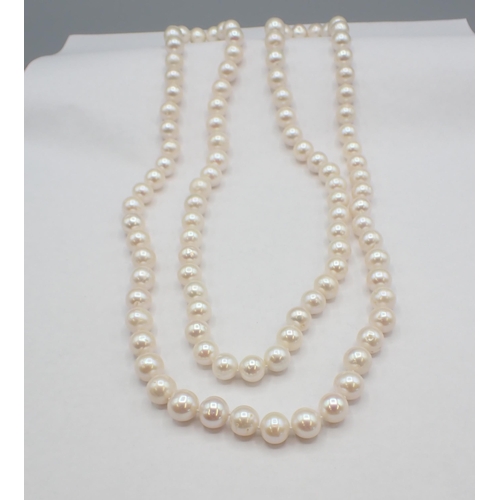 148 - An opera length string of large freshwater Cultured Pearls