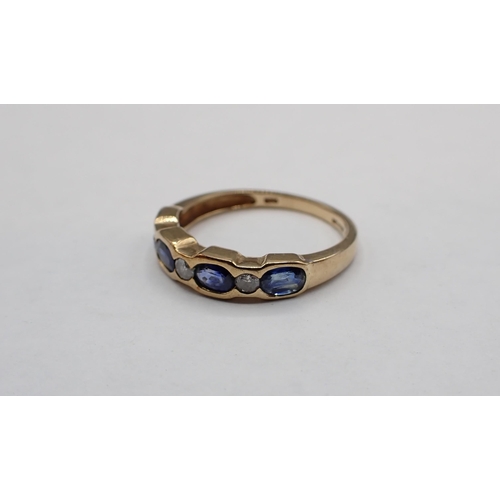 150 - A Sapphire and Diamond seven stone Ring invisibly-set four oval-cut sapphires interspersed with thee... 