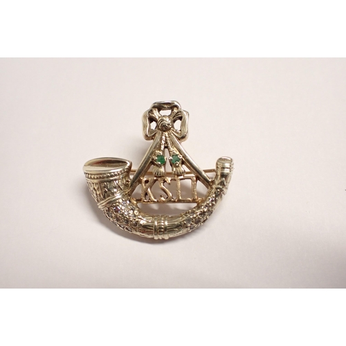 153 - A King's Shropshire Light Infantry Sweetheart Brooch formed as a bugle pavé-set eight-cut diamonds a... 