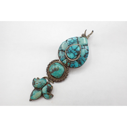 154 - An early Tibetan Earring set turquoise in matrix to white metal, A/F