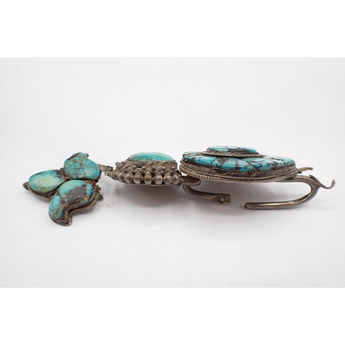 154 - An early Tibetan Earring set turquoise in matrix to white metal, A/F