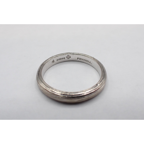 157 - A Theo Fennell Wedding Band in 18ct white gold, millennium hallmark, ring size M, approx 4.20gms