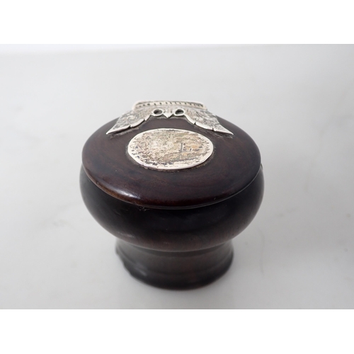 17 - A white metal mounted hardwood Snuff Mull of bombe form, butterfly hinge and oval panel, engraved P.... 