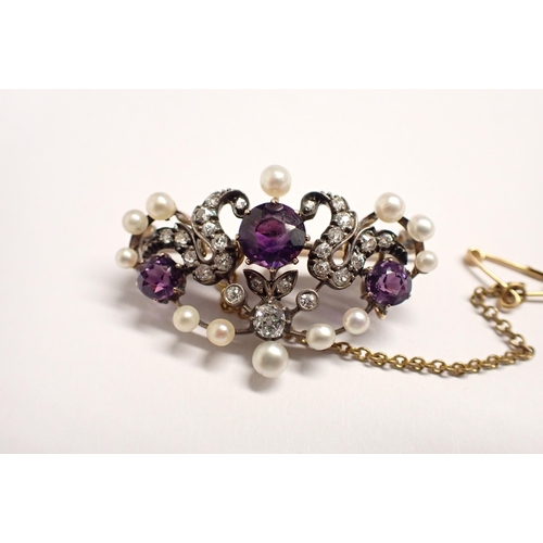 185 - An Amethyst, Diamond and Pearl Brooch the openwork plaque claw-set three round amethysts within old ... 