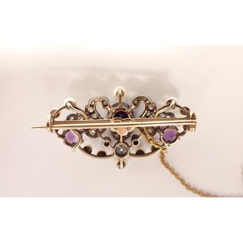 185 - An Amethyst, Diamond and Pearl Brooch the openwork plaque claw-set three round amethysts within old ... 