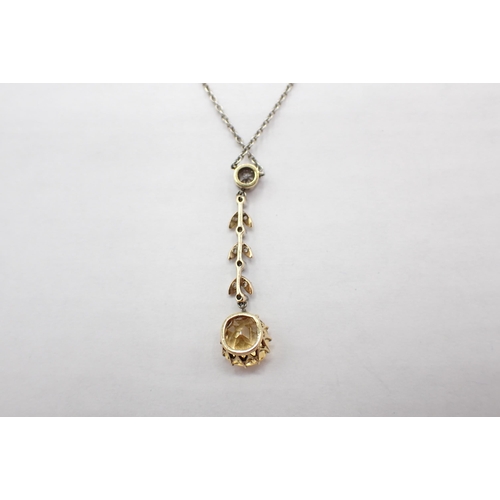 186 - A Diamond and yellow Topaz Necklace millegrain-set old-cut diamond above leaves set rose-cut stones ... 