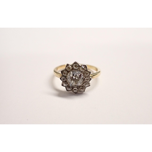 188 - A Georgian Diamond Cluster Ring close-set old-cut stone, estimated 0.85cts, within frame of smaller ... 