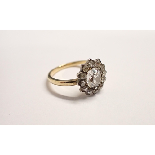 188 - A Georgian Diamond Cluster Ring close-set old-cut stone, estimated 0.85cts, within frame of smaller ... 