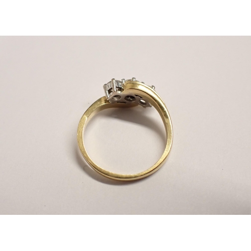 190 - A Diamond three stone crossover Ring claw-set graduated brilliant-cut stones, estimated total diamon... 