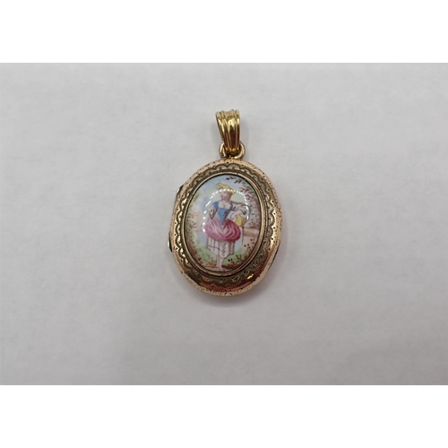 194 - A yellow metal oval Locket the front with enamel plaque painted girl carrying a basket, approx 25mm ... 