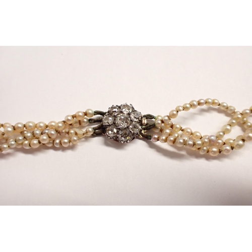 200 - A Victorian four strand graduated Pearl Necklace on diamond cluster clasp set eight old-cut stones i... 