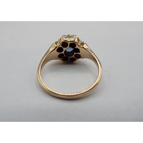 206 - A Sapphire and split Pearl Ring pavé-set oval-cut sapphire within frame of seed pearls, marked 9ct, ... 