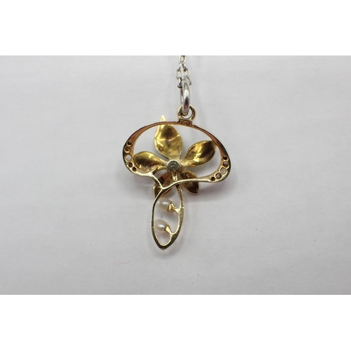 210 - An Art Nouveau Pendant set rose-cut diamonds and seed pearls with enamelled flower, marked 15ct, app... 