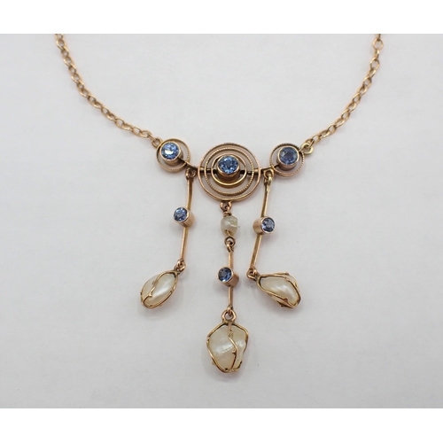 216 - A Necklace millegrain-set blue stones with three baroque pearl drops on fine chain marked 9ct, appro... 