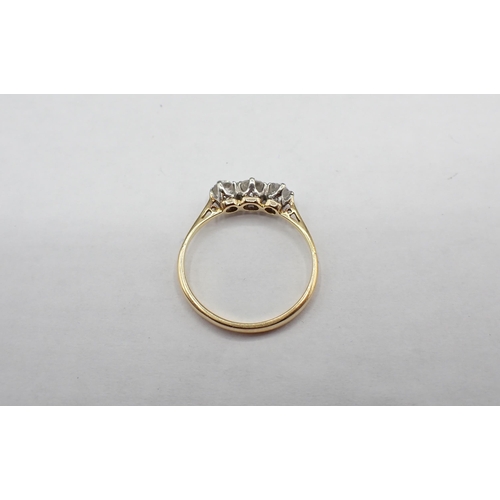 220 - A Diamond three stone Ring claw-set graduated old-cut stones, estimated total diamond weight 0.55cts... 