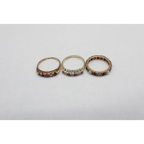 228 - A Garnet, Paste and Seed Pearl Eternity Ring ring size J 1/2 A/F, a Ruby and Diamond seven stone Rin... 