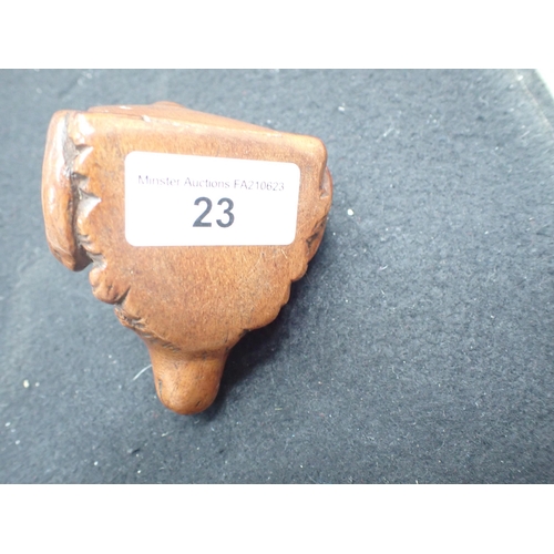 23 - A carved treen Snuff Mull in the form of a ram's head with inset glass eyes, 3in