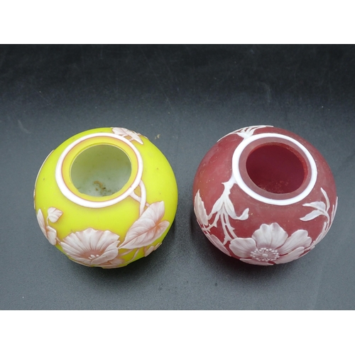 294 - Two Webb Cameo glass small globular Vases with floral and rose design, one yellow and one pink, 2½in... 