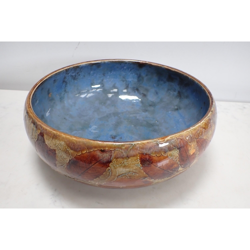 301 - A Royal Doulton Bowl with moulded leaf design in autumnal colours on a mottled ground, impressed mar... 