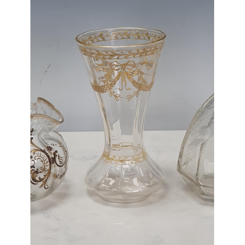 327 - An etched glass Decanter and Stopper 9in H, a panelled tapering glass Vase decorated gilded garlands... 