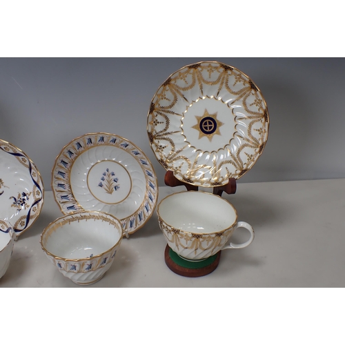 332 - Two Worcester Flight Tea Cups and Saucers, blue and gilt designs, and two Tea Bowls and Saucers (som... 