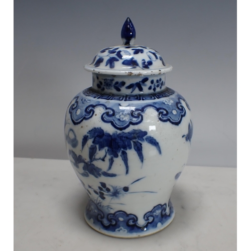 345 - A Chinese blue and white lidded Vase with butterfly, dragonfly and leafage designs, 8in H (small chi... 