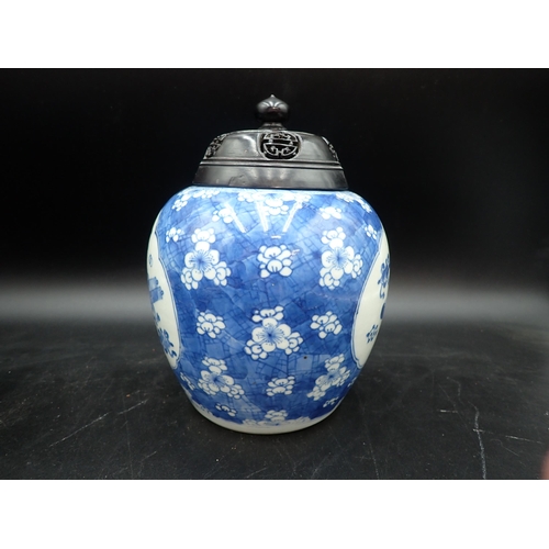 354 - A near pair of Chinese blue and white Ginger Jars with shaped oval reserves painted utensils, etc, p... 