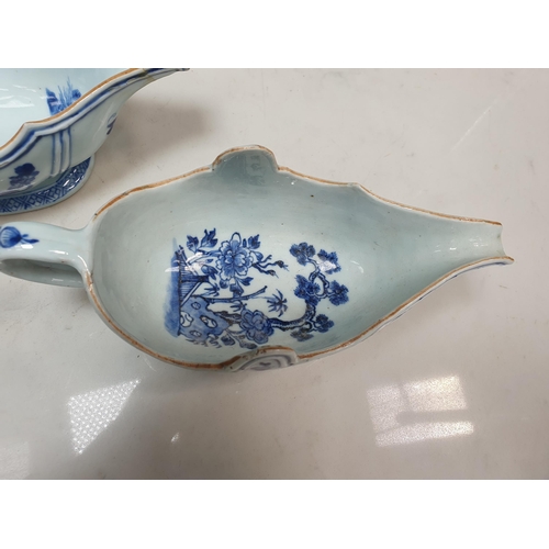 369 - Four Chinese blue & white Sauceboats, decorated flowers and landscapes, 9 1/2 and 7 1/2 in one A/F