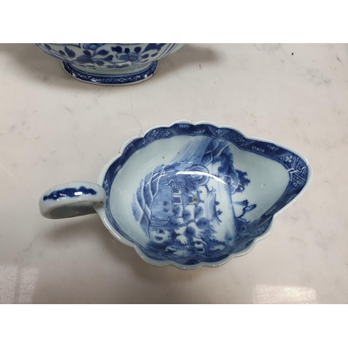 369 - Four Chinese blue & white Sauceboats, decorated flowers and landscapes, 9 1/2 and 7 1/2 in one A/F