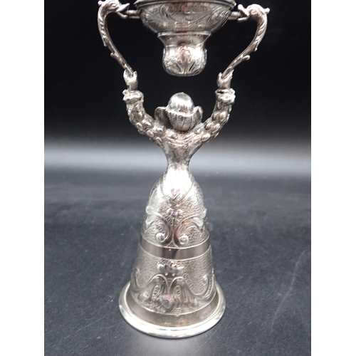 37 - A Continental silver Wager Cup with scale and scroll engraving, import mark London 1902