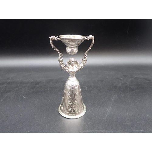 37 - A Continental silver Wager Cup with scale and scroll engraving, import mark London 1902