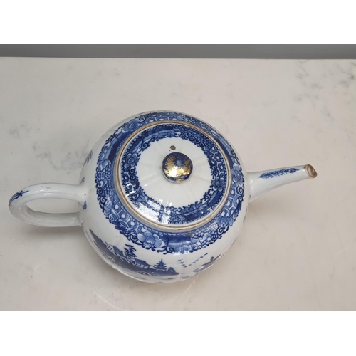 372 - A Chinese blue & white Teapot and Cover decorated buildings and figures in a landscape with gilt det... 