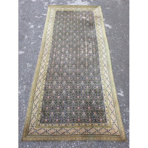 380 - A William Morris design Carpet having floral centre design. multi bordered with diamond shaped desig... 