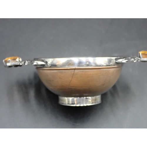 39 - A Scottish silver mounted treen Whisky Quaich, the centre engraved 'SGUAB AS 1', the ornate handles ... 