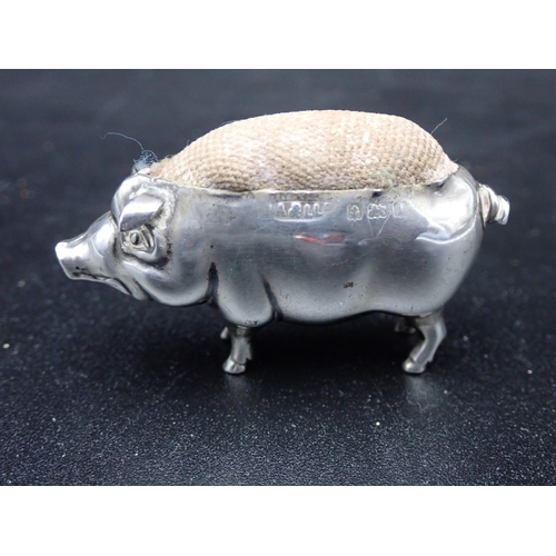 41 - An Edward VII silver Pig Pin Cushion, Birmingham 1908, maker: A & L Ld, 2in