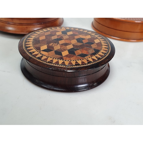 435 - A Collection of six circular wooden Snuff Boxes including a Tunbridge ware Box with geometric design... 