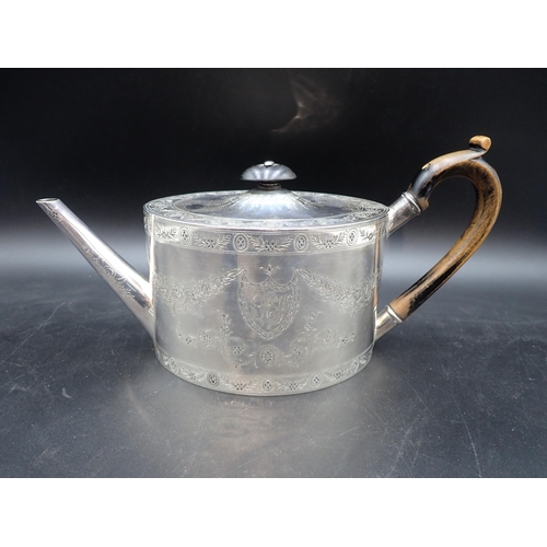 45 - An Edward VII silver oval Teapot of unusually large proportions, finely engraved floral swags and pa... 