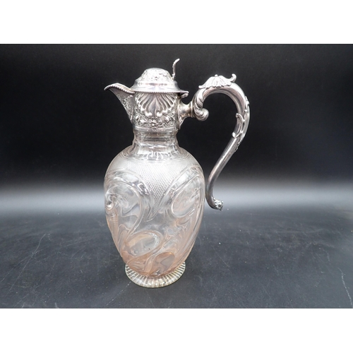 46 - An Edward VII silver mounted and lidded glass Claret Jug with floral and gadroon embossing, Sheffiel... 