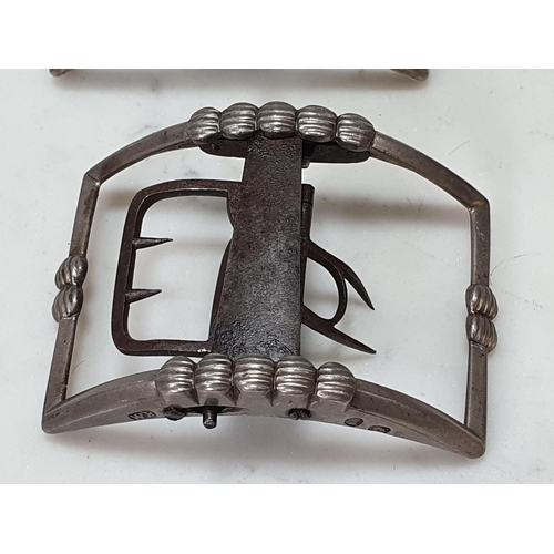 471 - A pair of steel Buckles, a pair of brass mounted Buckles and three others