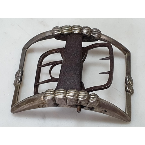 471 - A pair of steel Buckles, a pair of brass mounted Buckles and three others