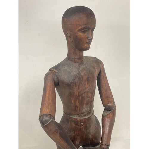 473 - A late 19th Century Lay Figure with finely carved facial features and feet, the well constructed bal... 