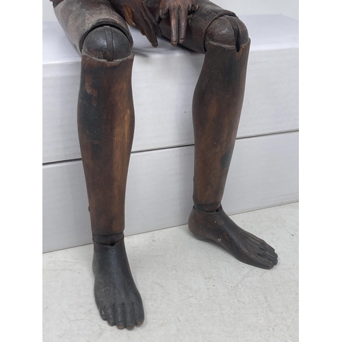 473 - A late 19th Century Lay Figure with finely carved facial features and feet, the well constructed bal... 