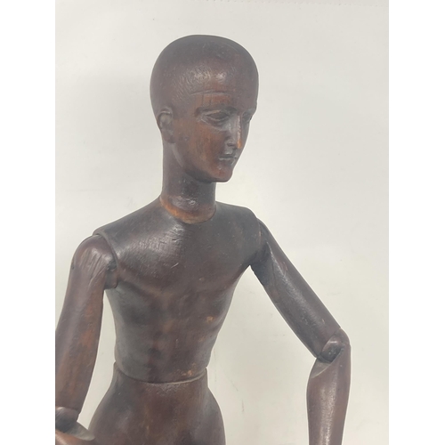 474 - A 19th Century Lay Figure with well carved face and working ball sockets 2ft 2in H