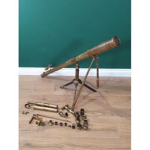 479 - A mid 19th Century brass Telescope by Dolland, London, on a tripod base, telescopic supports, with n... 