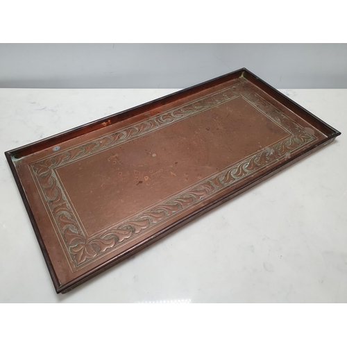 491 - A Keswick School, copper Tray of rectangular form with repeat floral motif design, 20 1/2in x 10in, ... 